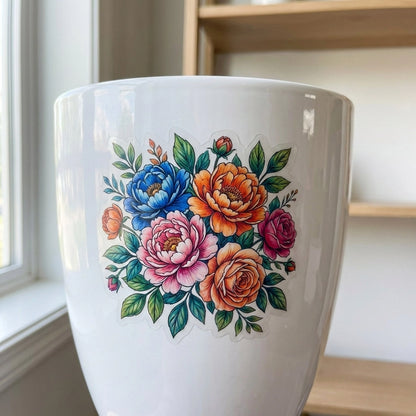 Clear transparent floral sticker applied on white ceramic mug, colorful peony and rose bouquet design with realistic transparency effect