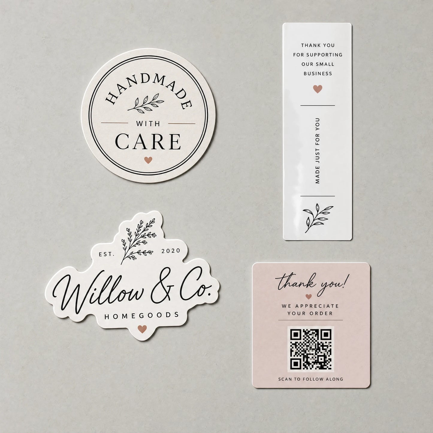 Assortment of custom box stickers in round, die-cut, and rectangle box seal shapes